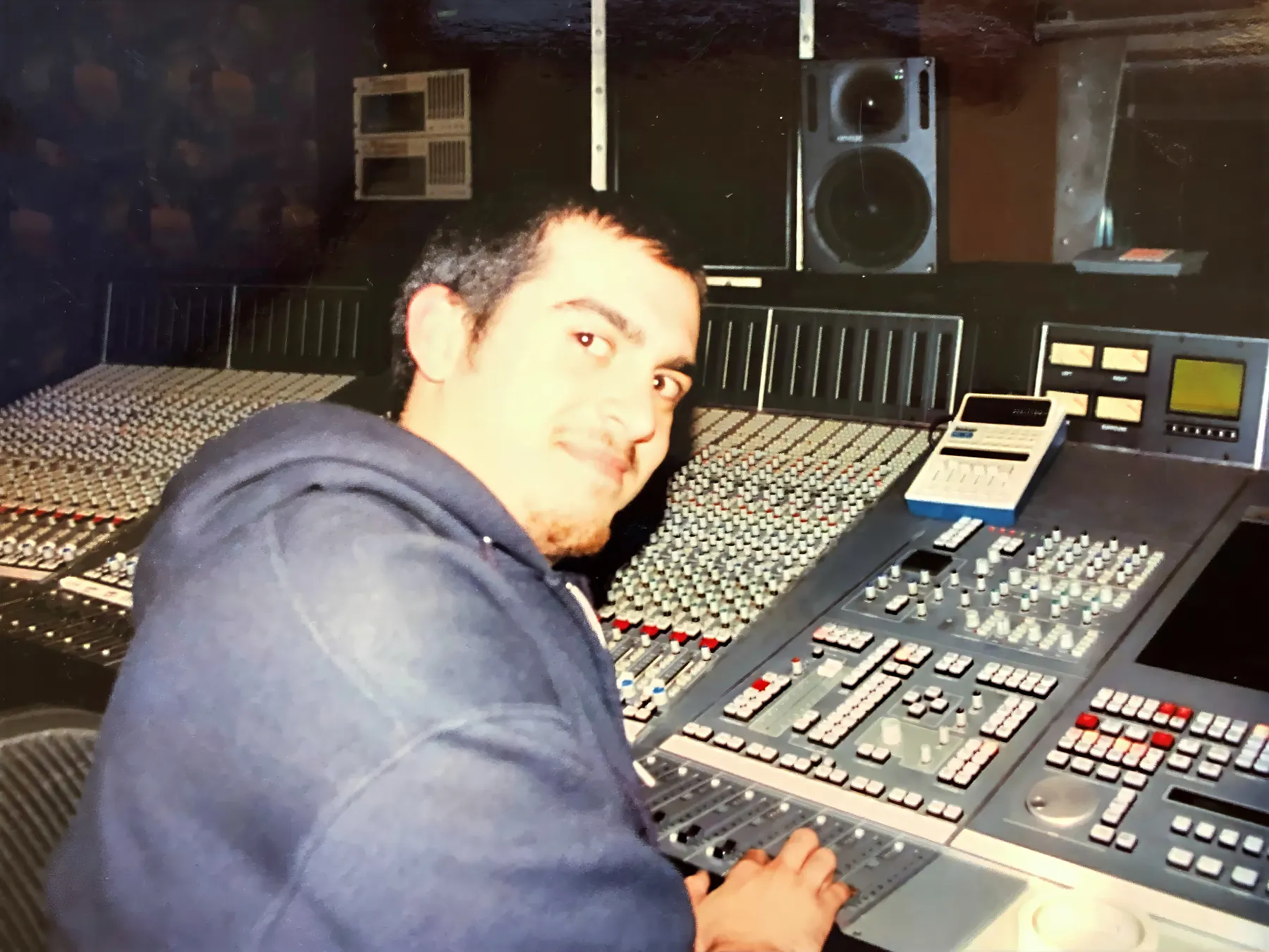 Bryan Loss at a large-format mixing console in 2004 during his audio engineering career.